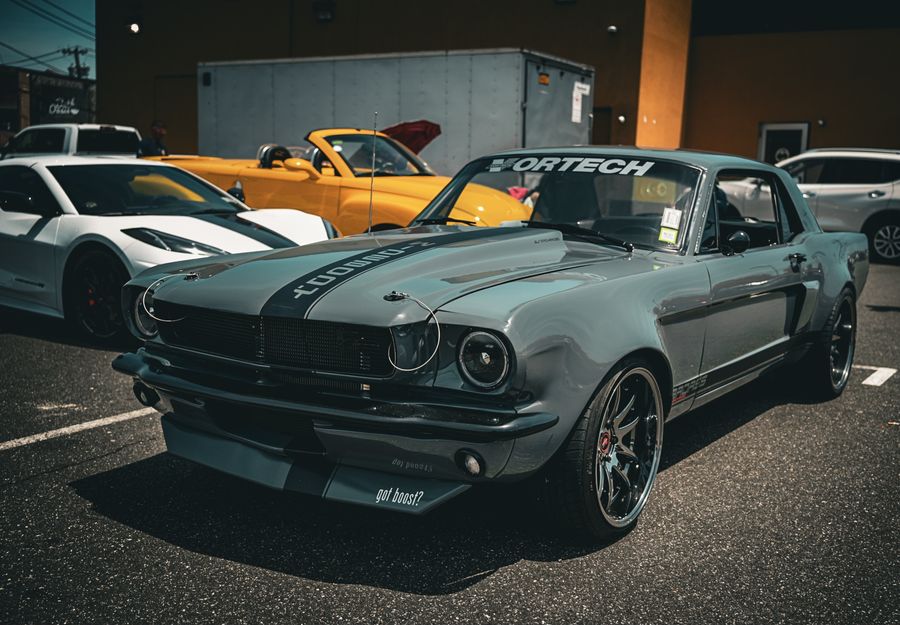 Custom restomod Mustang in an evening lot