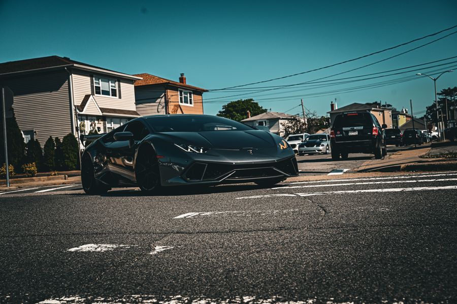 Black Lamborghini photographed on a New York street