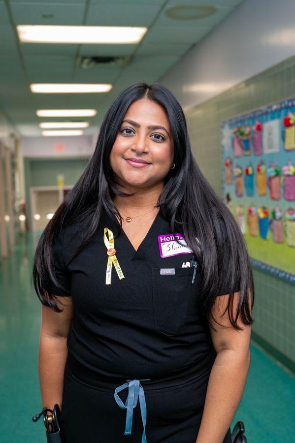 Nurse portrait with stethoscope, confident and warm