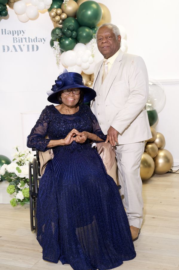 Elegant couple at a milestone birthday celebration