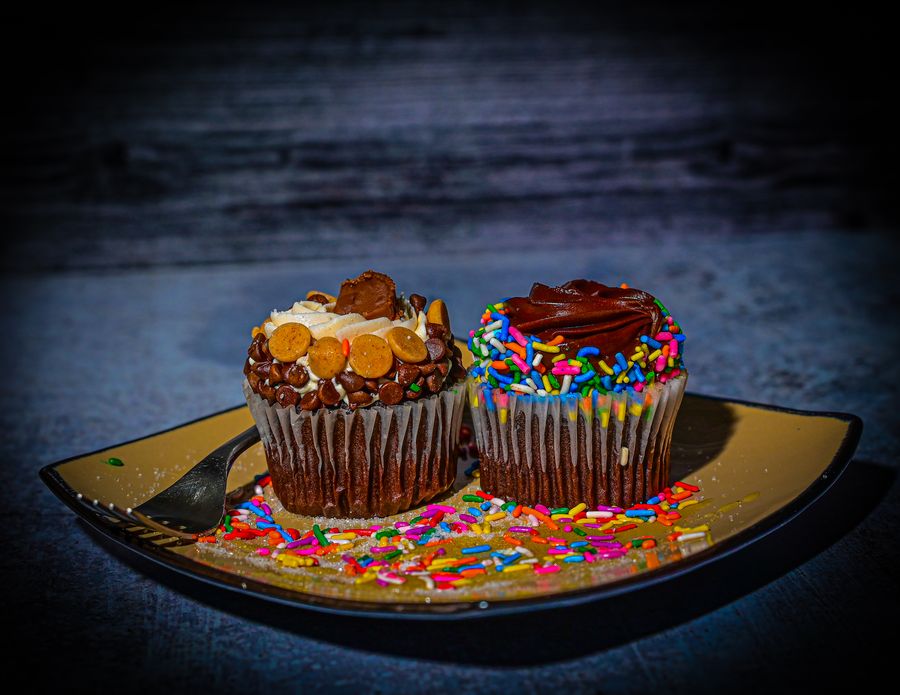 Cupcake pair in moody blue light